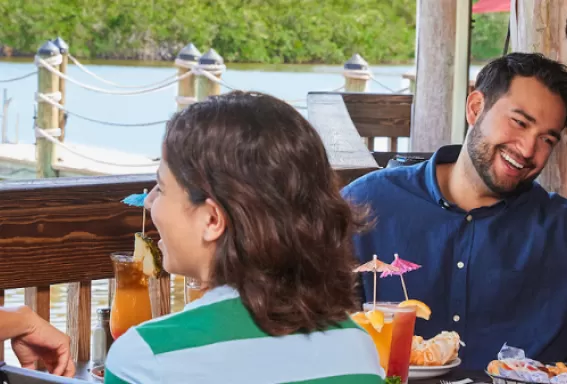 Family enjoying waterfront dining